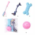 Detailed view of durable rubber and cotton rope dog chew toys set in packaging bag - Socket + Double Knot Rope + Spiky Ball + Spiky Bone / Four-Piece Set