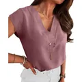 Detail view of mauve V-neck blouse showing textured fabric and elegant fit - Lotus root pink