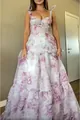 Detailed view of elegant floral organza evening dress with ribbon straps and tiered skirt. - S / Dresses / Light Purple