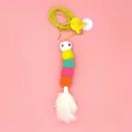 Vibrant colorful cat wand toy with soft pom-poms, bell and white feather on pink - White Feather Caterpillar
