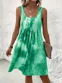Model wearing a green sleeveless tie-dye print dress with pleated chest detail - S / Dresses / Cyan