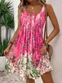Sommerliches Strandkleid mit pinkem Blumenmuster und lockerer, fließender Passform - S / Kleider / Fuchsia