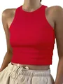 Detailed view of the bright red ribbed texture on this sleeveless crop tank top. - Red