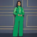 Full-body detail showing the sequined mesh texture and elegant wide-leg cut in green - S / Jumpsuits / Green
