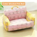 Sofá cama para gatos de forro polar grueso a cuadros rosas con ojos y asa superior - Respaldo Rosa de Contraste