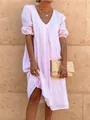 Detailed view of the breathable cotton linen pink midi dress featuring a stylish V-neckline - S / Dresses / Pink