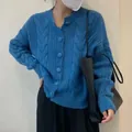 Casual women's blue cable knit cardigan with a loose fit and round neck design. - One Size / Tops / Blue