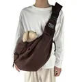 Brown foldable breathable pet sling carrier bag for small dogs and cats on a model. - Coffee