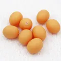 Giocattolo cigolante per cani a forma di uovo per la pulizia dei denti e l'addestramento - Uovo Squeaky / Colore Casuale