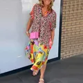 Trendy women's V-neck loose dress with vibrant leopard and tropical floral prints - S / Dress (18919) / Orange