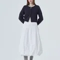 Women's charcoal gray knitted cardigan paired with a white pleated balloon skirt. - S / Tops / Black