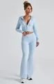 Completo due pezzi in maglia azzurro con top corto con cappuccio e pantaloni - Azzurro