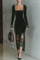 Detailed view of dark green velvet evening dress featuring intricate black lace trim - S / Dresses / Green