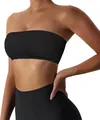 Close-up of black strapless tube top sport bra showing seamless fabric texture and fit - XS / Tops / Black