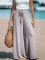Women's light grey high-waisted wide-leg trousers with drawstring in a beach setting - 2XL / Bottoms / Gray