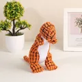 Dettaglio del giocattolo per cani dinosauro in peluche arancione in velluto di mais - Dinosauro / 30x14cm / Arancione