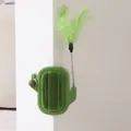 Green cactus cat self-groomer featuring a spring feather teaser and catnip ball - With Catnip Ball / 1 Piece / Green