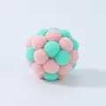 Soft plush cat toy ball featuring macaron pink and mint green colors for interactive fun - Green and Pink