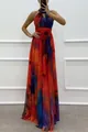 Detail shot of the vibrant red abstract floral print on a halter neck maxi dress - S / Dresses / Orange Red