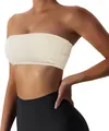 Detailed close-up of beige strapless bandeau sport bra showing seamless fabric texture - XS / Tops / Off White