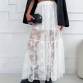 Elegante gonna lunga a trapezio in pizzo bianco trasparente con ricamo floreale - Taglia S / Bianco