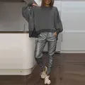 Casual women's side slit crewneck sweatshirt and metallic jogger pants set in a modern home - 2XL / Top And Bottom / Gray