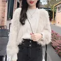 Stylish beige fuzzy knit sweater with elegant cable knit texture and soft shaggy sleeves - Tops / Apricot