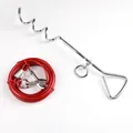 Close-up view of a chrome spiral dog ground stake with a red steel wire leash set - 1.8m--6ft / 8mm*41cm Stake + Red Steel Rope