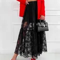 Elegante gonna lunga a balze in pizzo nero con motivo floreale trasparente a vita alta - Taglia S / Nero