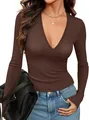 Detail view of a brown ribbed deep V-neck long-sleeve top showing slim fit texture. - S / Tops / Coffee