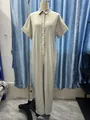 Elegant sage green short sleeve button down loose wide leg jumpsuit for summer wear - Pale Pea Green