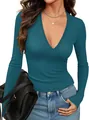 Detail of teal ribbed knit texture and deep V-neckline on long sleeve slim fit top - S / Tops / Malachite green