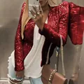 Detail of glamorous red sequin jacket with stand collar and shimmering finish - S / Tops / Red