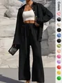 Elegant women's black long-sleeve shirt and wide-leg trousers set in textured fabric - S / Top And Bottom / Black