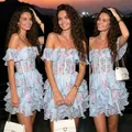 Detail of sweet light blue floral off-the-shoulder tiered mini dress in evening setting - S / Dresses / Light Blue