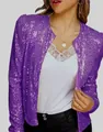 Close-up detail of a shimmering purple sequined cropped jacket with long sleeves for women - S / Tops / Purple