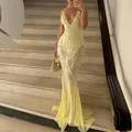 Elegant pale yellow V-neck sequined mermaid evening gown featuring a sexy backless design - S / Dresses / Light Yellow