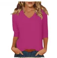 Close-up view of a casual pink women's V-neck t-shirt with three-quarter sleeves - Rose Red