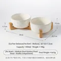 Double white ceramic pet bowls with embossed cat paw pattern and sturdy bamboo stand - Double Bowl Set (Medium Tall) / Double Bowl Stand [Bamboo]