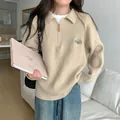 Maglione polo beige oversize con mezza zip e ricamo verde con lettere per donna - Taglia unica / Top / Albicocca