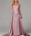 Elegant pink long-sleeved sequined evening gown with satin overskirt for formal galas. - Pink