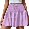 Close-up detail of lavender smocked waist ruffled shorts with adjustable drawstring - Purple