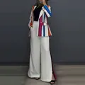 Detail of colorful vertical striped blazer and white wide-leg trousers two-piece set - White Striped