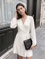 Elegant white V-neck wrap dress with long puff sleeves and waist tie detail. - S / Dresses / White