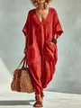Full shot of a red V-neck cotton linen jumpsuit with large pockets for beach vacation. - S / Dresses / Red