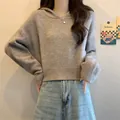 Pull à capuche court en maille grise pour femme, coupe décontractée et texture douce - Taille unique / Hauts / Kaki