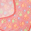 Detailed texture of a soft pink fleece pet blanket with colorful paw print design - Footprint / XS: 40*60cm / Red