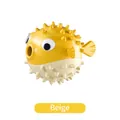 Pufferfish shaped dog treat dispenser toy in beige, made of durable TPR material. - Yellow