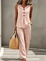 Detail of a pink sleeveless V-neck linen top and wide-leg trousers set for summer. - S / Top And Bottom / Pink