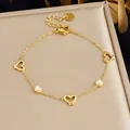 Elegantes goldfarbenes Herzarmband mit funkelnden Strasssteinen aus Edelstahl für Damen - Armband